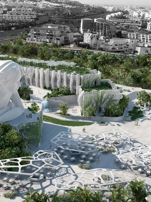 Aerial view of the wellness complex, a colossal reclining figure set among terraced gardens, pavilions and fountains above the town.