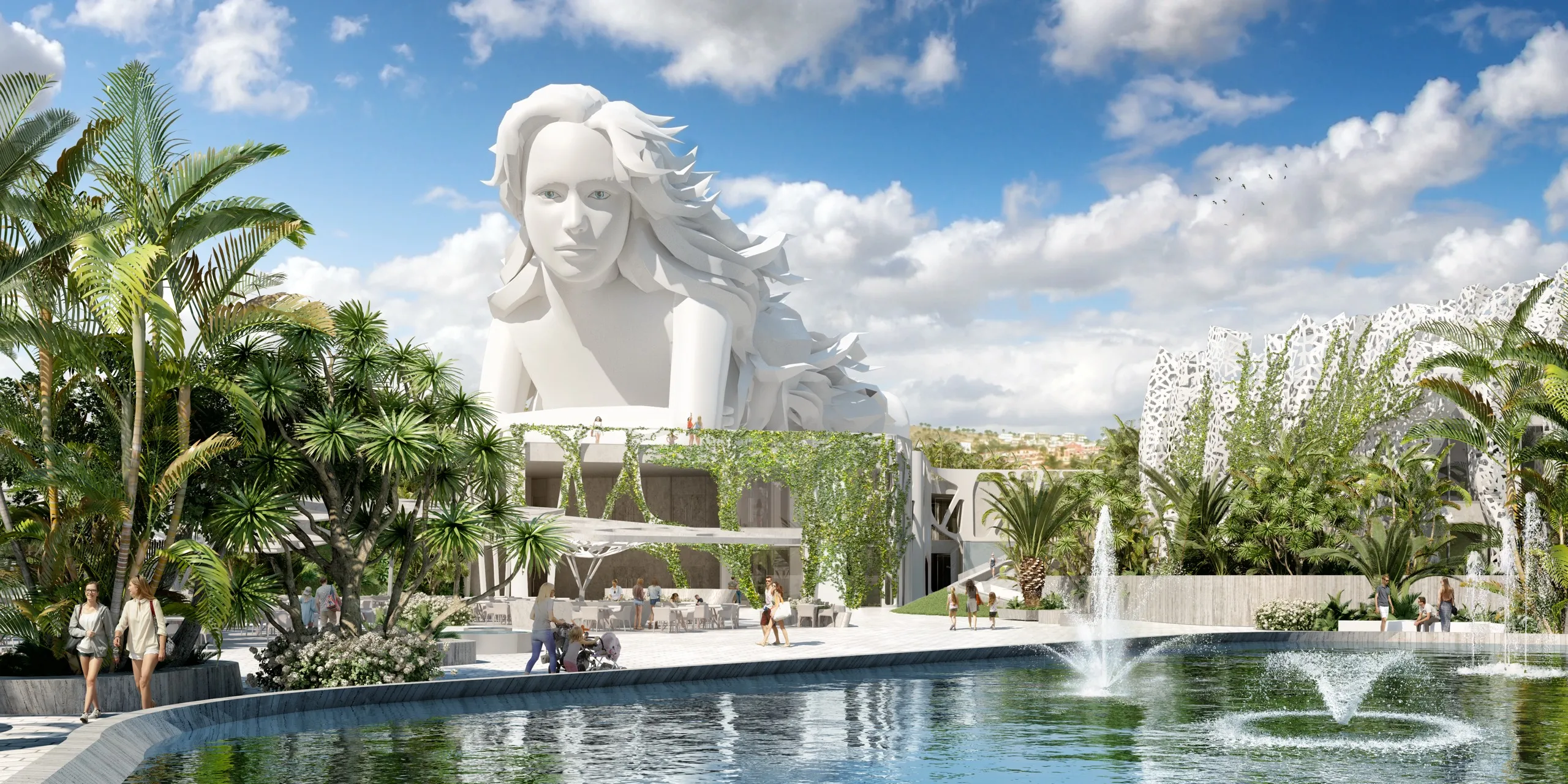 Una escultura blanca monumental de la cabeza y los hombros de una mujer que se alza sobre una plaza ajardinada con palmeras y fuentes.