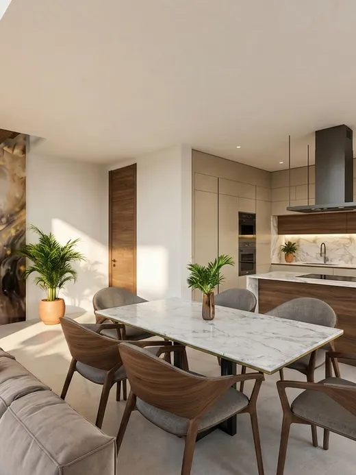 Dining and living area with a walnut dining table and chairs, a dark abstract art panel beside the floating stair, and the open kitchen beyond.